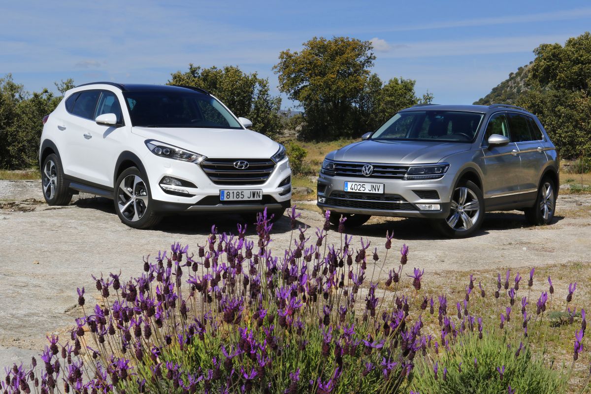 Hyundai Tucson 2.0 CRDI 136 CV o Volkswagen Tiguan 2.0 TDI 150 CV. Frontales primer plano